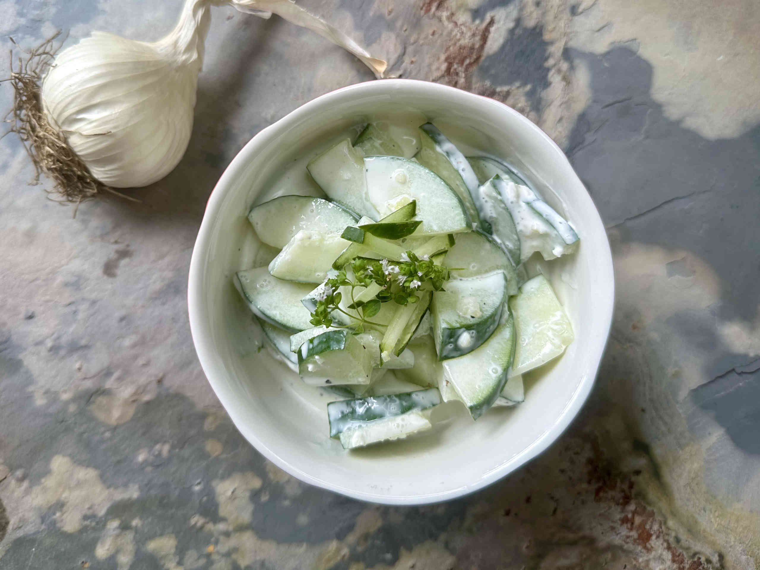 Fresh cucumber salad with sour cream © Alexandra Gorsche